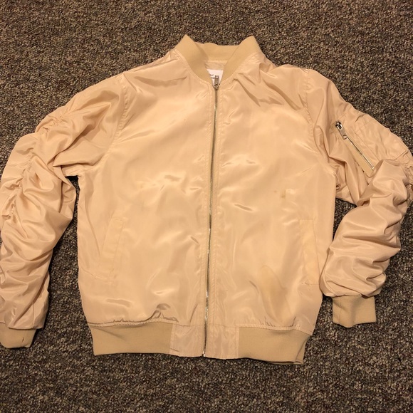 cream colored bomber jacket